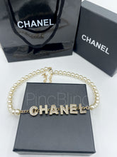 Branded luxe necklace