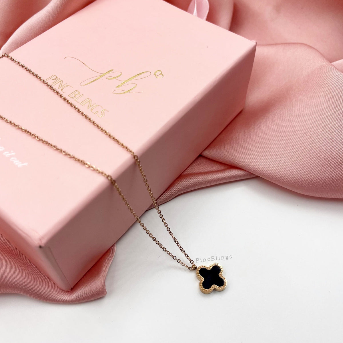 Black clover necklace